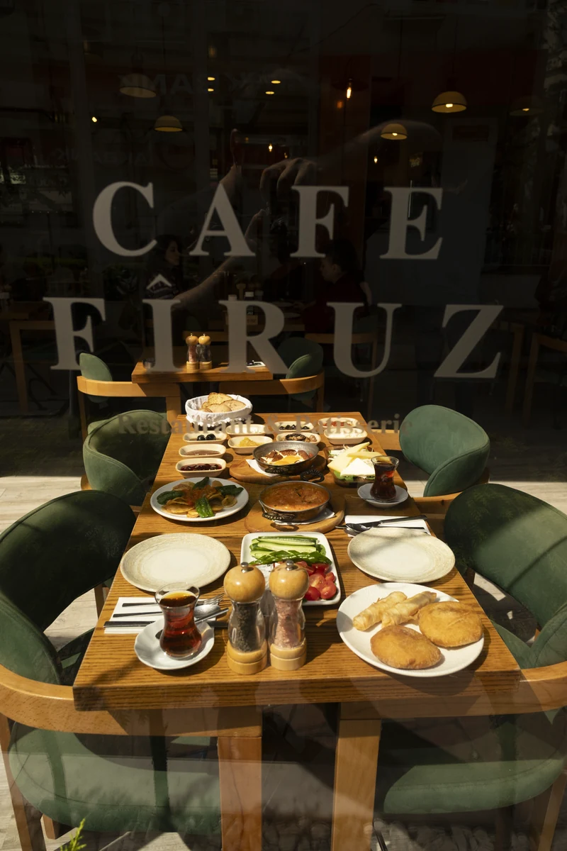 A breakfast table set behind the Cafe Firuz window